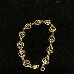 avon bright gold tone openwork heart Chain bracelet